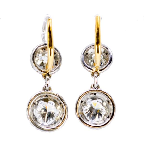 Diamond pendant earrings in platinum.