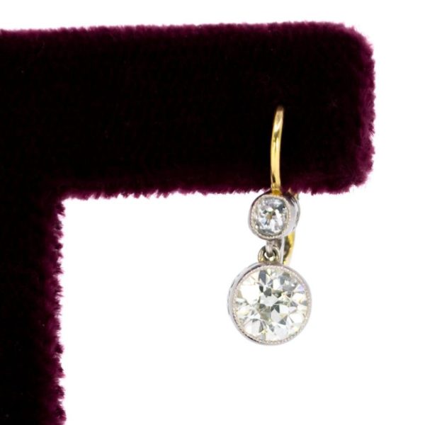 Old mine cut diamond pendant earrings in platinum.