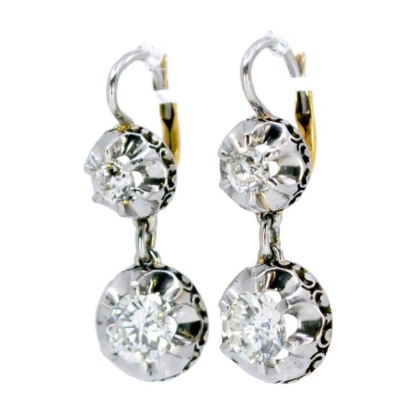 Diamond pendant earrings in platinum.