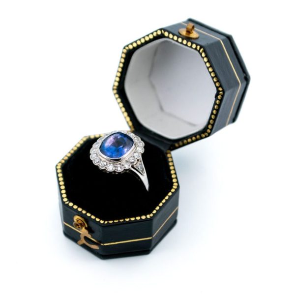 Sapphire and diamond cluster ring in platinum.