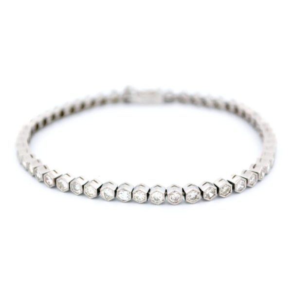 Diamond tennis bracelet in platinum.