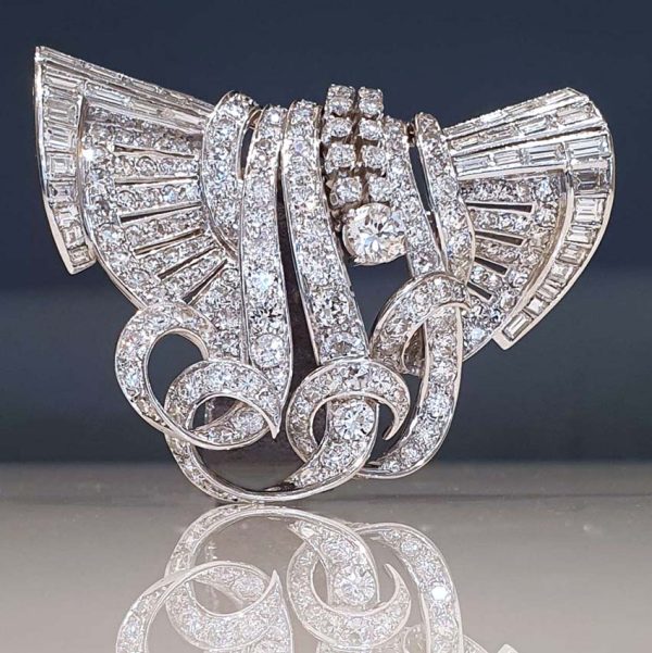 Late Art Deco 9ct Diamond Set Platinum Brooch, set with 9 carats of baguette-cut and brilliant-cut diamonds in handmade platinum setting, late 1930s