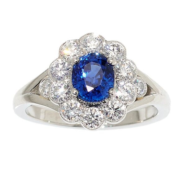 Certified Natural No Heat Sapphire and Diamond Cluster Engagement Ring, untreated 1.37ct oval sapphire surrounded by brilliant-cut diamonds in platinum