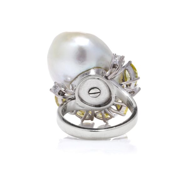 Baroque pearl and diamond ring in white gold.