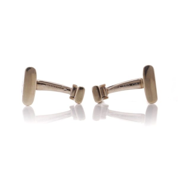 Van Cleef & Arpels gold and mother of pearl cufflinks.