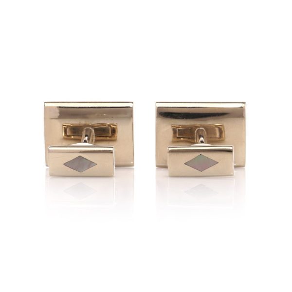 Van Cleef & Arpels gold and mother of pearl cufflinks.