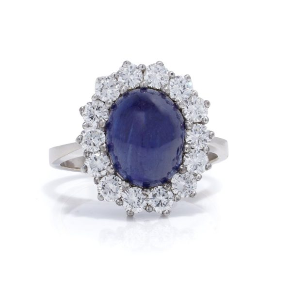 Sapphire and diamond cluster ring in white gold.