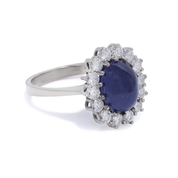 Sapphire and diamond cluster ring in white gold.