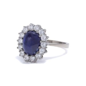 Sapphire and diamond cluster ring in white gold.