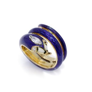 Diamond and enamel snake ring in gold. 