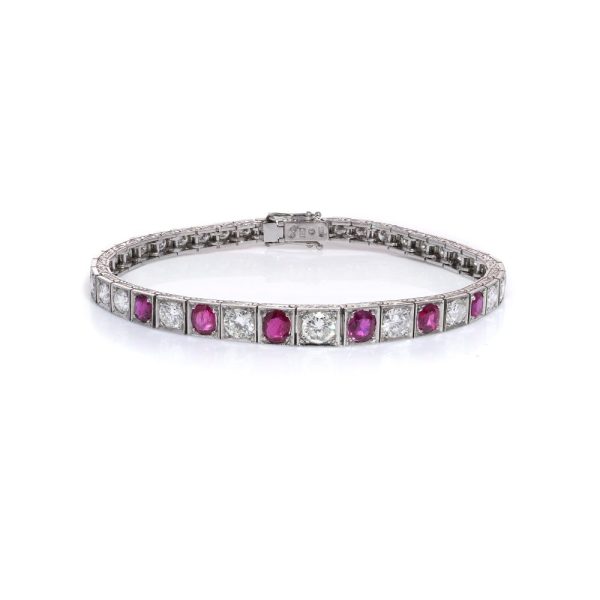 Natural Burma Ruby and Diamond Line Bracelet in Platinum, individual square shaped articulated links set with 4.65cts round brilliant-cut diamonds and 2.22cts oval natural no heat Burma rubies