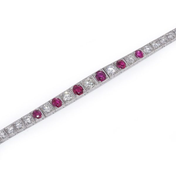 Natural Burma Ruby and Diamond Line Bracelet in Platinum, individual square shaped articulated links set with 4.65cts round brilliant-cut diamonds and 2.22cts oval natural no heat Burma rubies