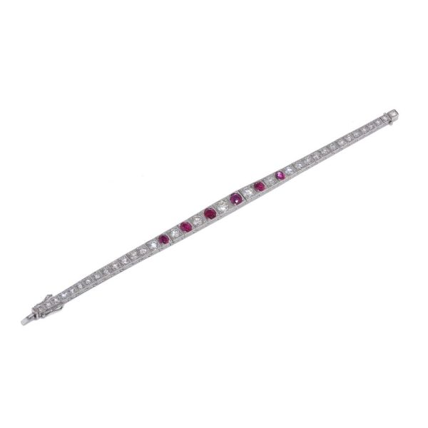 Natural Burma Ruby and Diamond Line Bracelet in Platinum, individual square shaped articulated links set with 4.65cts round brilliant-cut diamonds and 2.22cts oval natural no heat Burma rubies