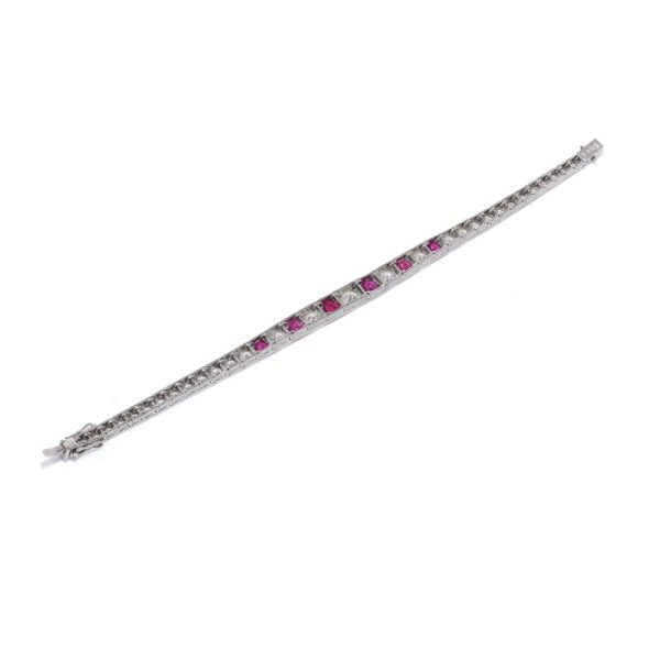 Natural Burma Ruby and Diamond Line Bracelet in Platinum, individual square shaped articulated links set with 4.65cts round brilliant-cut diamonds and 2.22cts oval natural no heat Burma rubies