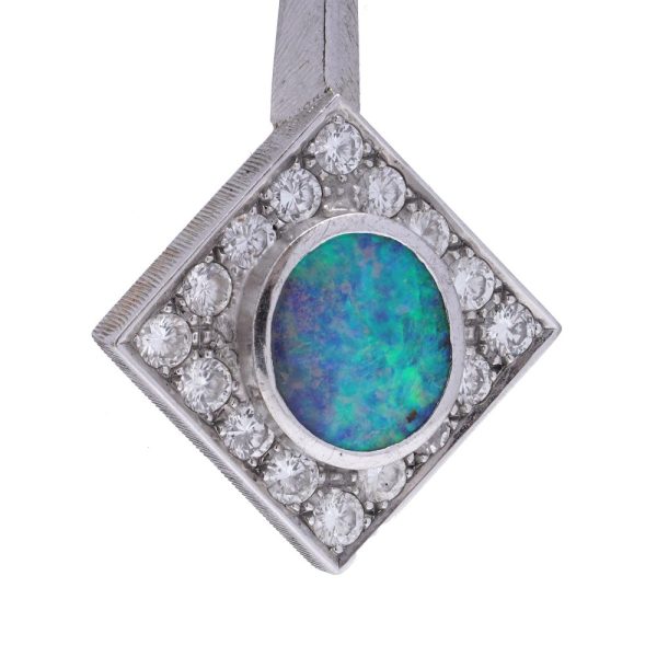 Opal and diamond earrings in white gold.