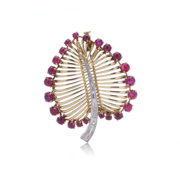 Vintage gold and platinum diamond and ruby leaf brooch.