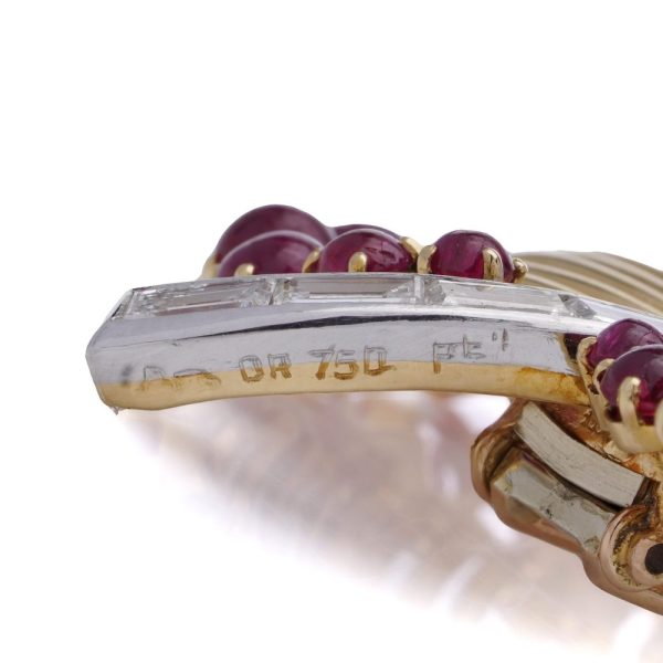 Vintage gold and platinum diamond and ruby leaf brooch.