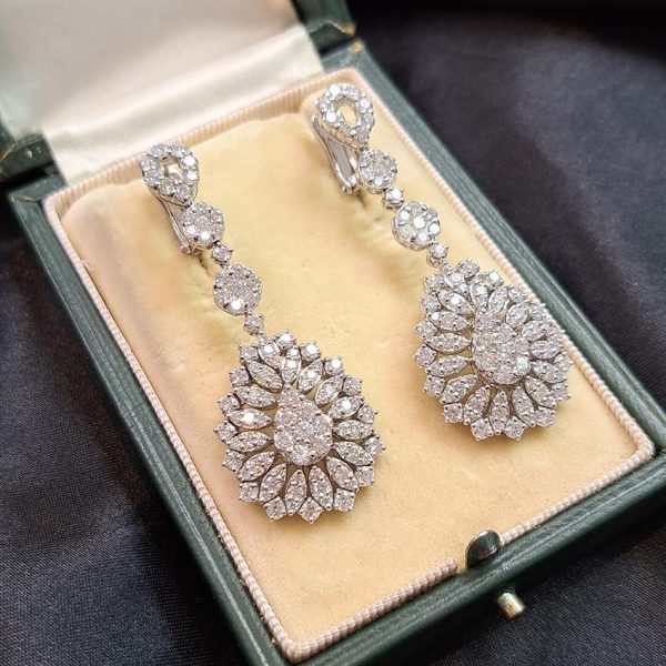 6ct Diamond Pear Shaped Cluster Drop Earrings, 6 carats of sparkling round brilliant-cut diamonds arranged in pear shaped drops accented with marquise shaped surrounds in 18ct white gold
