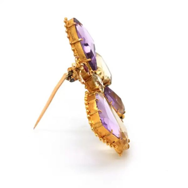 Antique Regency Amethyst and Citrine Butterfly Brooch with rose-cut garnet head in 18ct yellow gold with beaded gold borders. Early 19th century Circa 1810s