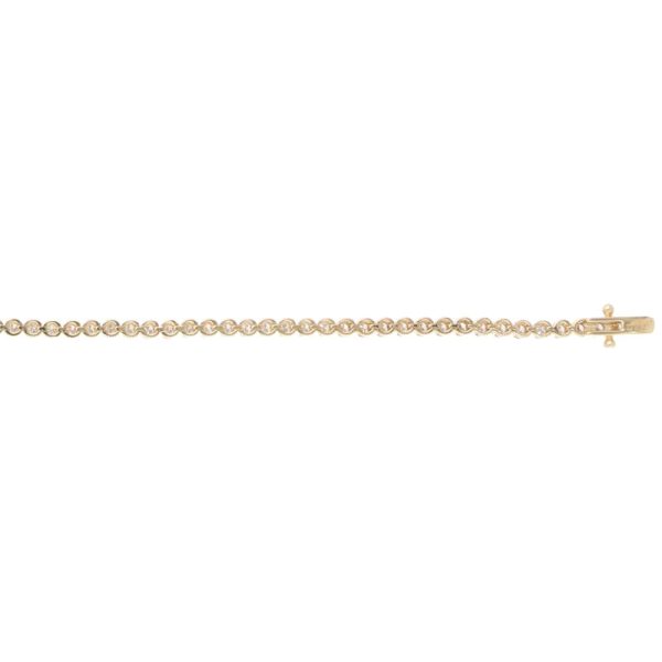 A contemporary 1.08ct diamond bezel set line bracelet crafted in 18ct yellow gold with 75 round brilliant cut diamonds.