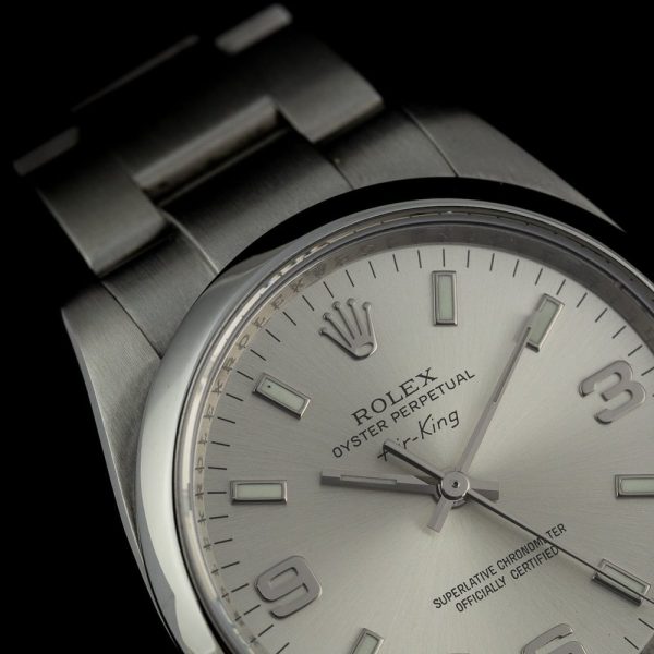 Rolex Air King 114200 34mm Stainless Steel Automatic Watch, silver dial and smooth polished bezel on steel bracelet strap