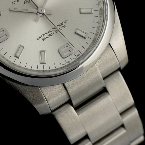 Rolex Air King 114200 34mm Stainless Steel Automatic Watch, silver dial and smooth polished bezel on steel bracelet strap