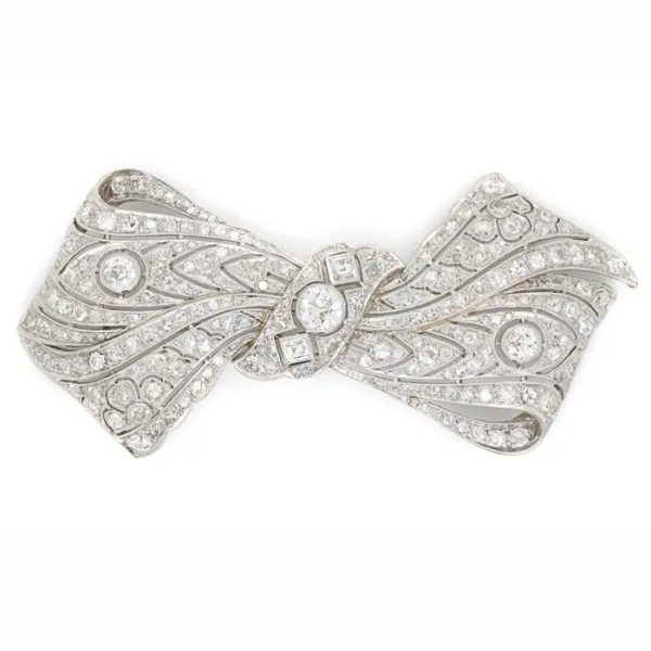 Vintage 8ct Old Cut Diamond Bow Brooch, set with 8 carats of old-cut, single-cut and square shaped diamonds in 18ct white gold with a 14ct white gold pin