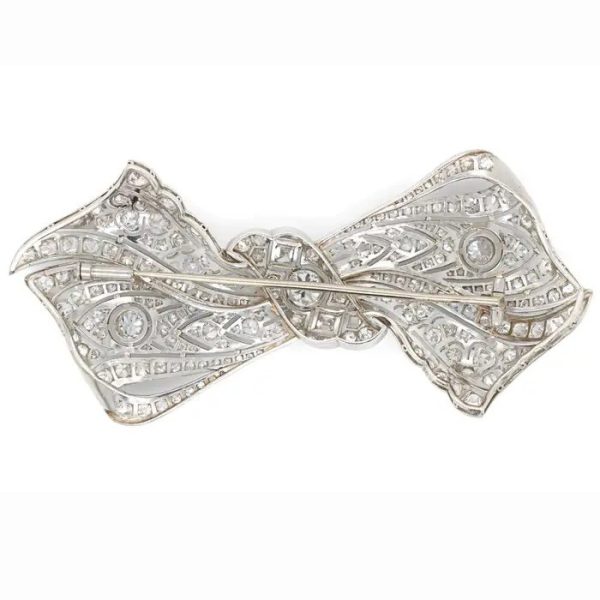 Vintage 8ct Old Cut Diamond Bow Brooch, set with 8 carats of old-cut, single-cut and square shaped diamonds in 18ct white gold with a 14ct white gold pin