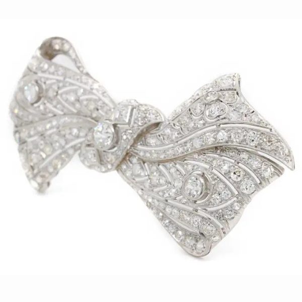 Vintage 8ct Old Cut Diamond Bow Brooch, set with 8 carats of old-cut, single-cut and square shaped diamonds in 18ct white gold with a 14ct white gold pin