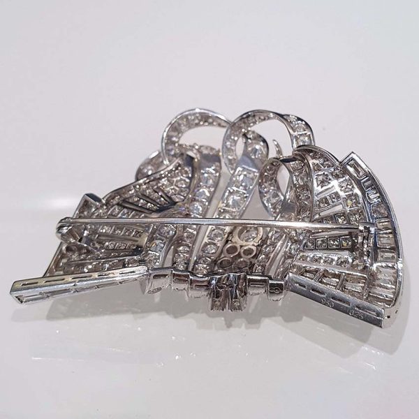 Late Art Deco 9ct Diamond Set Platinum Brooch, set with 9 carats of baguette-cut and brilliant-cut diamonds in handmade platinum setting, late 1930s