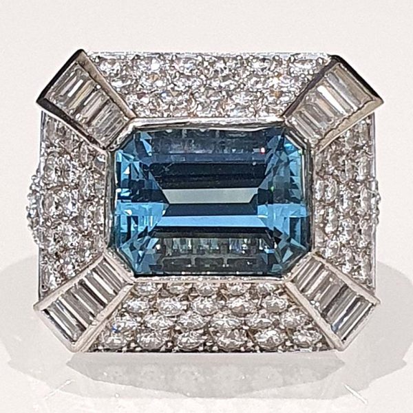 Vintage 4ct Aquamarine and Diamond Bombe Cluster Ring, 4ct good colour emerald-cut aquamarine set atop a handmade geometric platinum mount, Circa 1980s