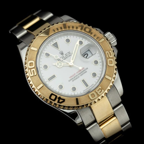 Rolex Yacht Master 16623 Gold and Steel 2009 Watch with Box and Papers, 40mm case with white dial surrounded by Sandblasted bi-directional yellow gold bezel