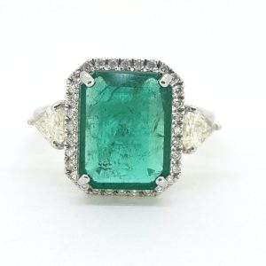 3.85ct Emerald and Diamond Cluster Ring with Trillion Diamond Sides in 18ct White Gold