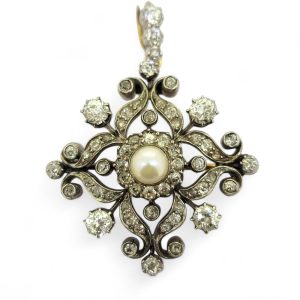 Victorian Antique Natural Pearl and Diamond Pendant come Brooch, central natural pearl surrounded by sparkling diamond in floral cluster design Presented in antique fitted box.