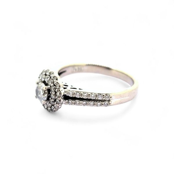 Diamond Halo Cluster Engagement Ring, central diamond surrounded by double border of diamonds in 18ct gold with two rows of diamonds to each shoulder