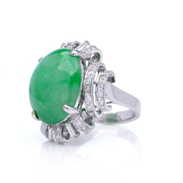 Vintage 23ct Natural Jadeite Jade and Diamond Cluster Ring, cabochon certified natural jade surrounded brilliant and baguette-cut diamonds in 14ct white gold. Circa 1970s