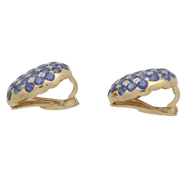 A pair of vintage sapphire and diamond checkerboard design earrings made in 18ct yellow gold and platinum