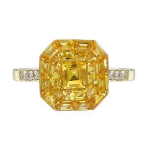 Yellow Sapphire Octagonal Cluster Solitaire Engagement Ring, 5.27cts yellow sapphires arranged in an invisible setting to produce an octagonal shaped design in 14ct yellow gold with diamond set shoulders