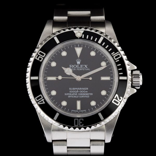 Rolex Submariner 14060M 4 Liner Unpolished NOS Watch with Box and Papers, non date Sub totally unworn, unpolished and retaining original factory case back and bracelet clasp stickers