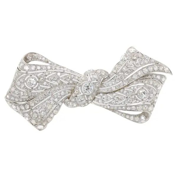 Vintage 8ct Old Cut Diamond Bow Brooch, set with 8 carats of old-cut, single-cut and square shaped diamonds in 18ct white gold with a 14ct white gold pin