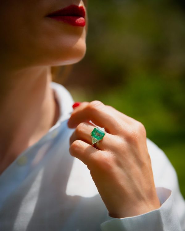 Emerald and diamond ring in gold and platinum.