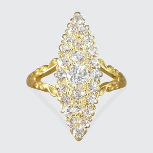 Antique diamond marquise cluster ring in yellow gold.