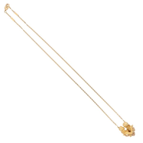 Ruby and diamond necklace in yellow gold.