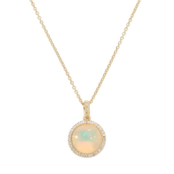 Opal and diamond pendant necklace in gold.
