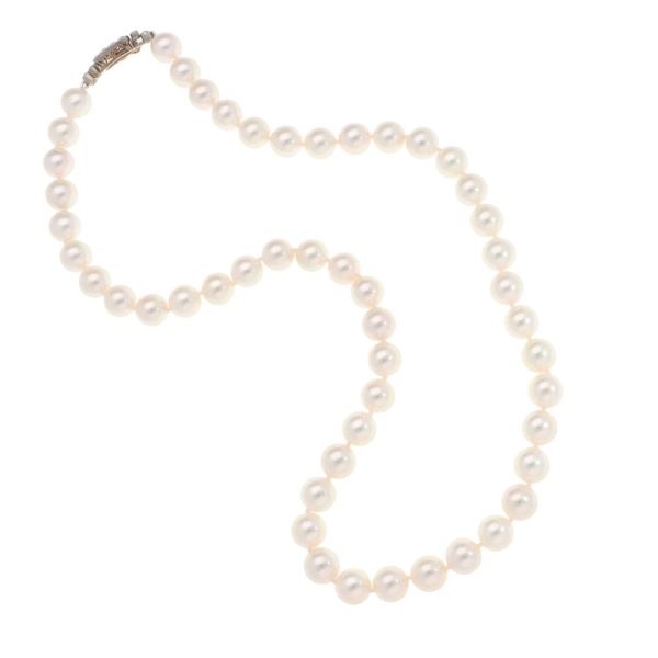 Akoya pearl necklace with a vintage Art Deco diamond clasp.
