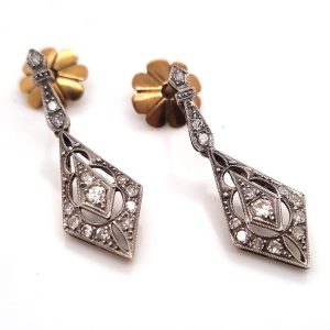 Victorian Antique 0.80ct Diamond Cluster Drop Earrings, kite-shaped design with pierced openwork in silver upon gold. Late 19th century Circa 1880