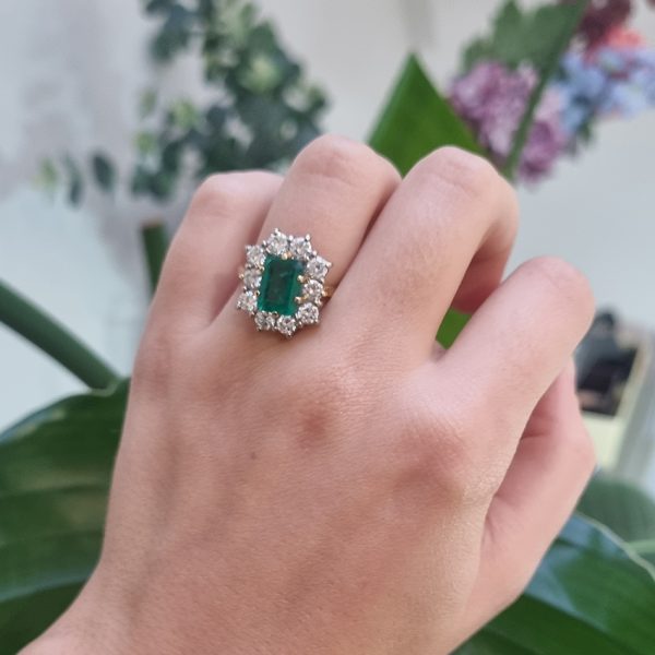 Vintage 2ct Emerald Cut Emerald and 1.50ct Diamond Cluster Engagement Ring in 18ct yellow gold