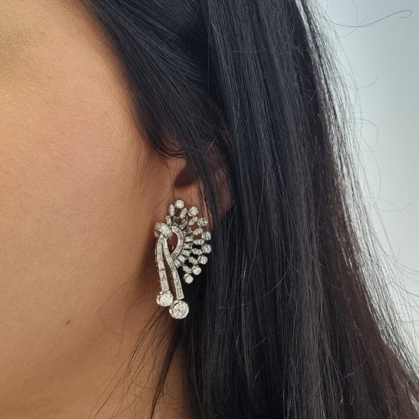 Carl Bucherer Vintage Diamond Spray Earrings in Platinum, set with sparkling brilliant, baguette and marquise-cut diamonds with post and clip fittings. Circa 1950s