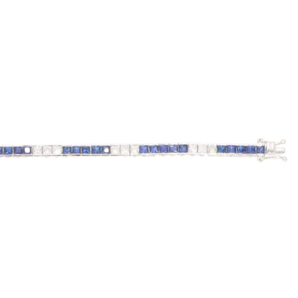 Sapphire and diamond tennis bracelet in white gold.