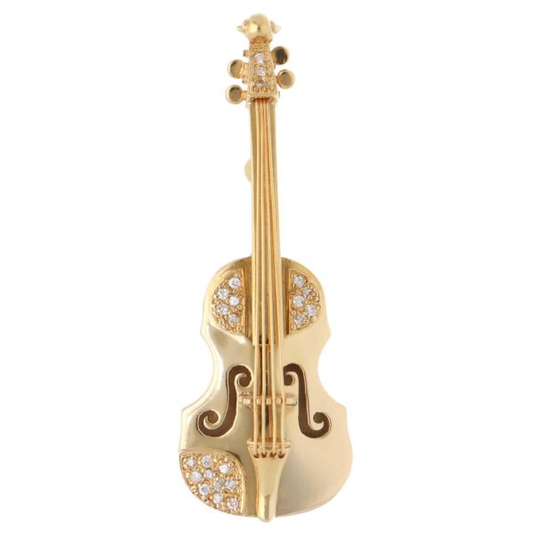 Diamond violin brooch in yellow gold.